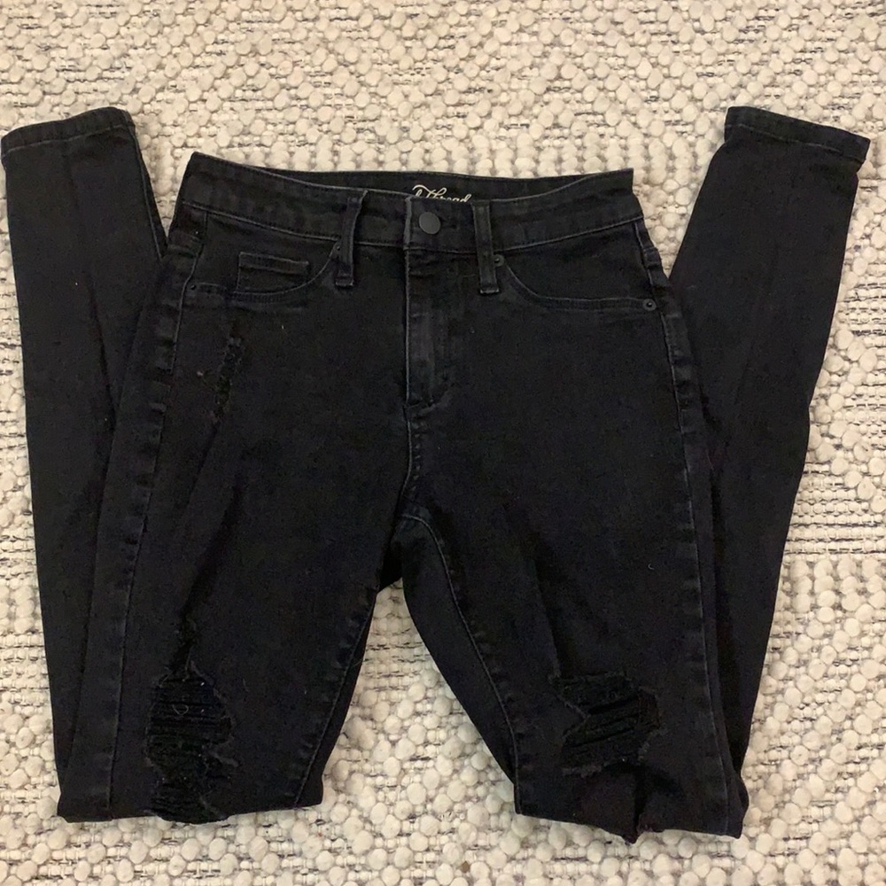Ripped black skinny jeans